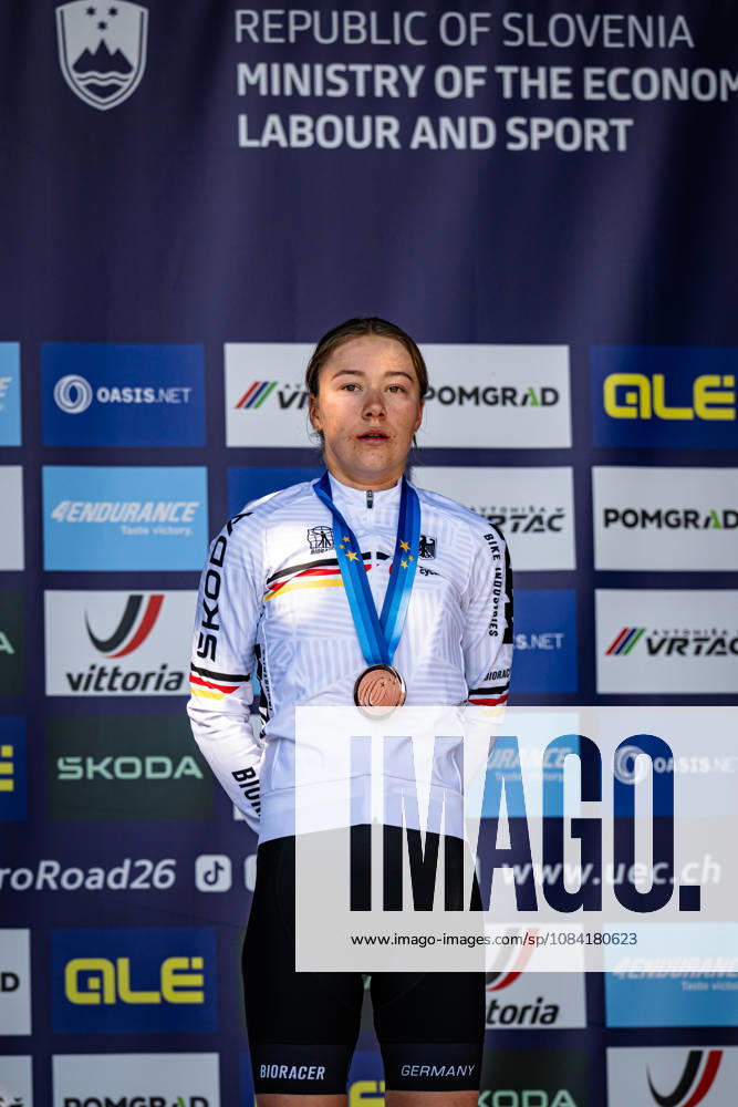 DWORATZEK Klara: UEC Road cycling, Rad, Radsport, Strasse European Championships - Ljubljana 2026 DWORATZEK Klara ( GER ) Germany Third Place - Award Ceremony Medal Ceremony Podium - Hochformat hoch vertikal Portrait - Event Veranstaltung: UEC Road Cycling European Championships 2026 Ljubljana - Category Kategorie: Cycling - Road Cycling European Championships - Road Race Junior Women U19 - Location Ort: Europe Slovenia - Sencur - Å enÄur - Discipline: Road Race ( RR ) - Distance: 66,3 km - Date Datum: 04.10.2026 Sunday Day 3 -