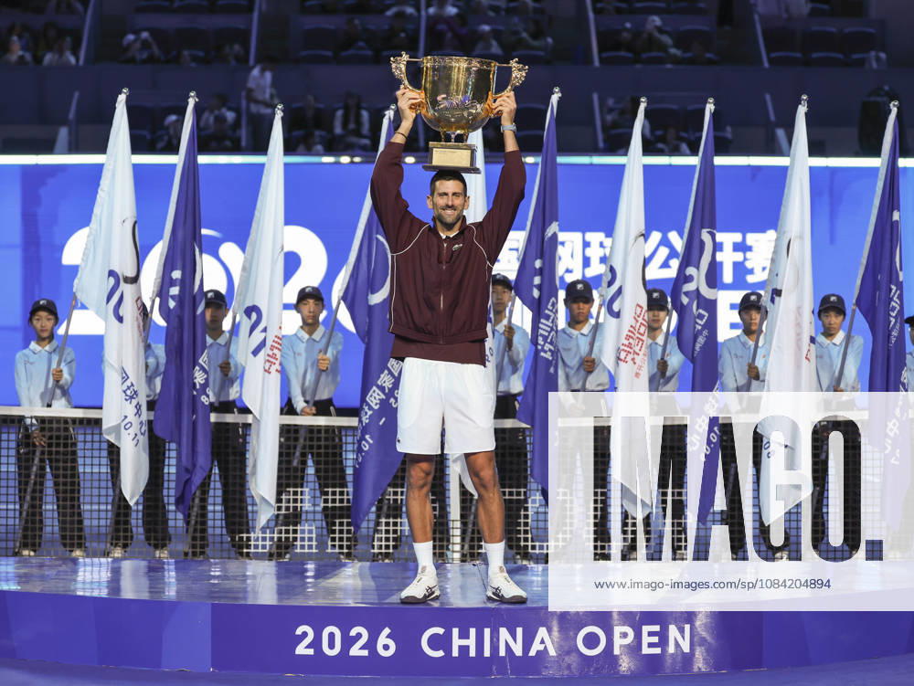 (261006) -- BEIJING, Oct. 6, 2026 -- Novak Djokovic of Serbia holds up the champion trophy during the awarding ceremony for the men s singles final at 2026 China Open tennis tournament in Beijing, China, Oct. 6, 2026. ) (SP)CHINA-BEIJING-TENNIS-CHINA OPEN-MEN S SINGLES-AWARDING CEREMONY(CN) BaixXuefei