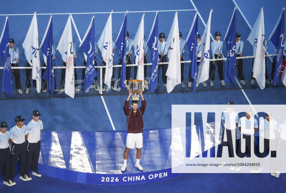 (261006) -- BEIJING, Oct. 6, 2026 -- Novak Djokovic of Serbia holds up the champion trophy during the awarding ceremony for the men s singles final at 2026 China Open tennis tournament in Beijing, China, Oct. 6, 2026. (Photo by Xinhua) (SP)CHINA-BEIJING-TENNIS-CHINA OPEN-MEN S SINGLES-AWARDING CEREMONY(CN) MaxZihan