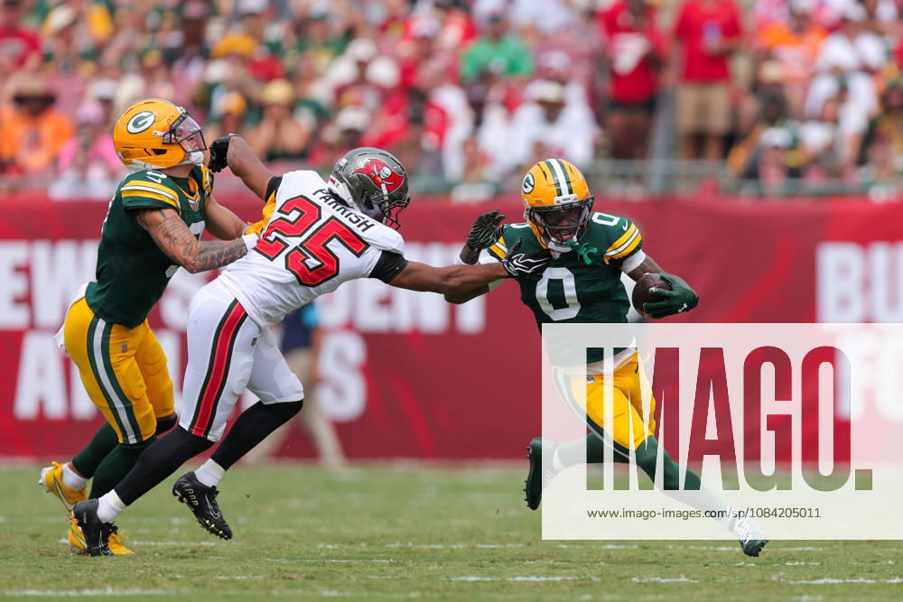Oct 4, 2026; Tampa, FL, USA; Green Bay Packers wide receiver Matthew Golden (0) attempts to avoid a tackle by Tampa Bay Buccaneers cornerback Jacob Parrish (25) during the NFL, American Football Herren, USA game between the Green Bay Packers and Tampa Bay Buccaneers at Raymond James Stadium. Mandatory Credit: Taylor McFee-Cal Media Tampa USA - ZUMAc04_ 20261004_zma_c04_622