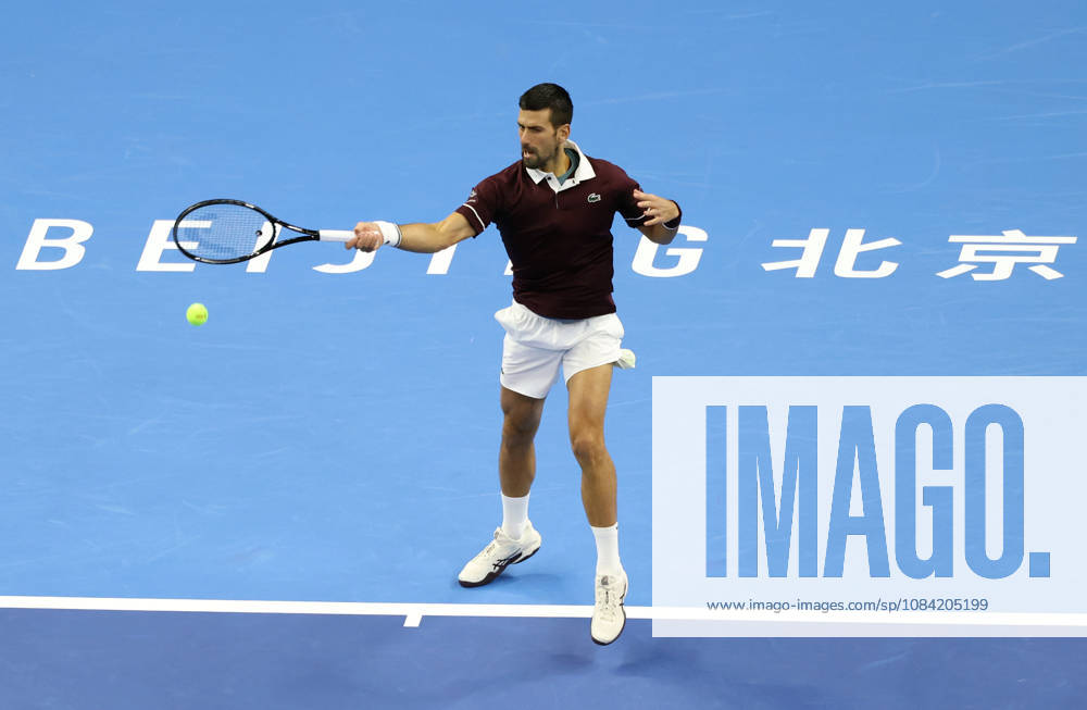 (261006) -- BEIJING, Oct. 6, 2026 -- Novak Djokovic of Serbia hits a return during the men s singles final against Alex de Minaur of Australia at 2026 China Open tennis tournament in Beijing, China, Oct. 6, 2026. ) (SP)CHINA-BEIJING-TENNIS-CHINA OPEN-MEN S SINGLES-FINAL(CN) ZhangxChenlin
