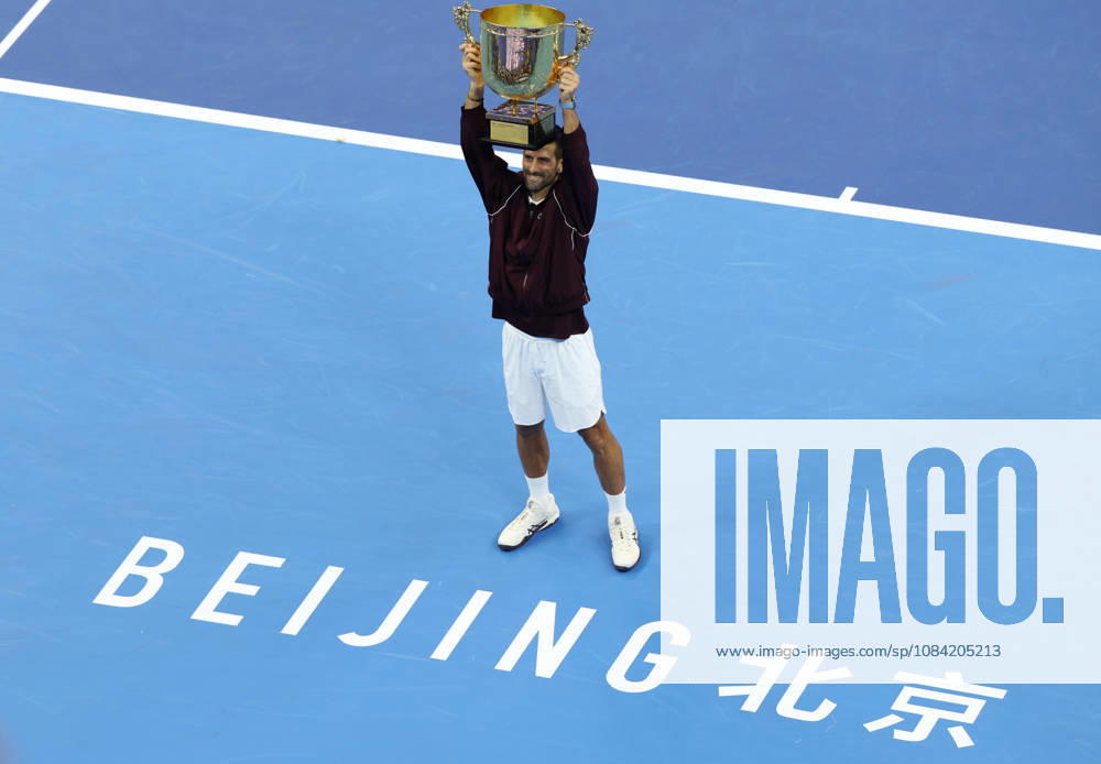 (261006) -- BEIJING, Oct. 6, 2026 -- Winner Novak Djokovic of Serbia holds up the champion trophy during the awarding ceremony for the men s singles final at 2026 China Open tennis tournament in Beijing, China, Oct. 6, 2026. ) (SP)CHINA-BEIJING-TENNIS-CHINA OPEN-MEN S SINGLES-AWARDING CEREMONY(CN) ZhangxChenlin