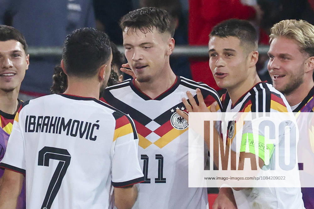 Dzenan Pejcinovic (Germany) celebrates after scoring his teams second goal with Arijon Ibrahimovic (Germany) and Nicolo Tresoldi (Germany) during the UEFA Under21 EURO Qualifier, EM, Europameisterschaft between Germany U21, U 21 and Georgia U21 at Almstadion on October 6, 2026 in Bielefeld, Germany. (Photo by Marco Steinbrenner DeFodi Images) -