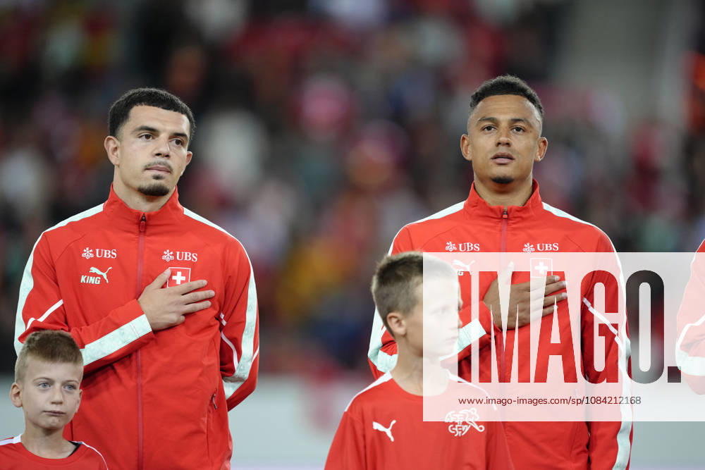 Mohamed Zeki Amdouni (10 SUI) and Dan Ndoye (11 SUI) during National anthem before the UEFA Nations League match between Switzerland and North Macedonia at thermoplan arena on October 06, 2026 in Luzern, Switzerland.