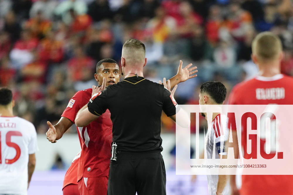Manuel Akanji (5 SUI) talks to Referee Edgars Majcevs during the UEFA Nations League match between Switzerland and North Macedonia at thermoplan arena on October 06, 2026 in Luzern, Switzerland.
