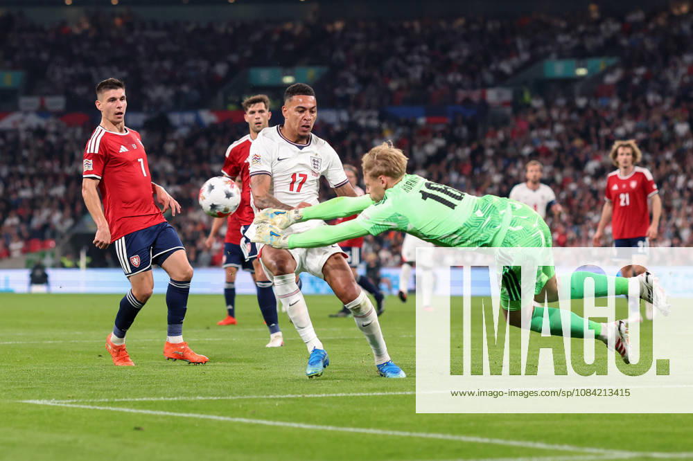 England v Czechia 06 October 2026, London - International Football - UEFA Nations League - England v Czechia - Czechia goalkeeper Lukas Hornicek punches the ball clear and sends Morgan Rogers of England flying - Photo: Charlotte Wilson Offside. London UK