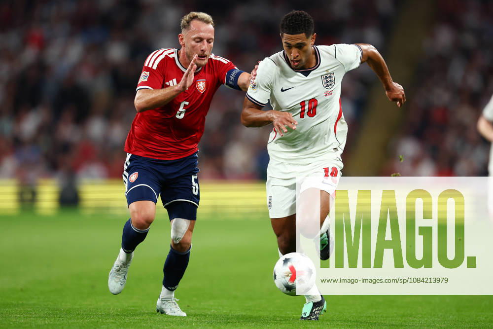 London, England, 6th October 2026. Vladimir Coufal of Czechia and Jude Bellingham of England challenge for the balluring the England vs Czech Republic UEFA Nations League match at Wembley Stadium, London. Picture credit should read: Paul Terry Sportimage . SPI_016_PT_England__Czechia SPI-5055-0016