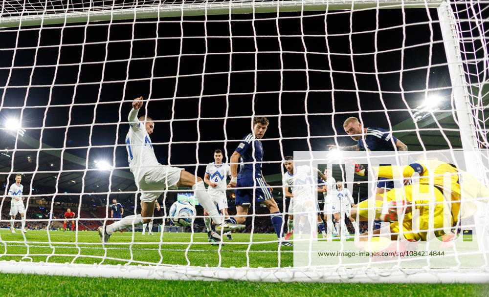 Scotland v Slovenia: Ryan Christie of Scotland scores with a backheel
