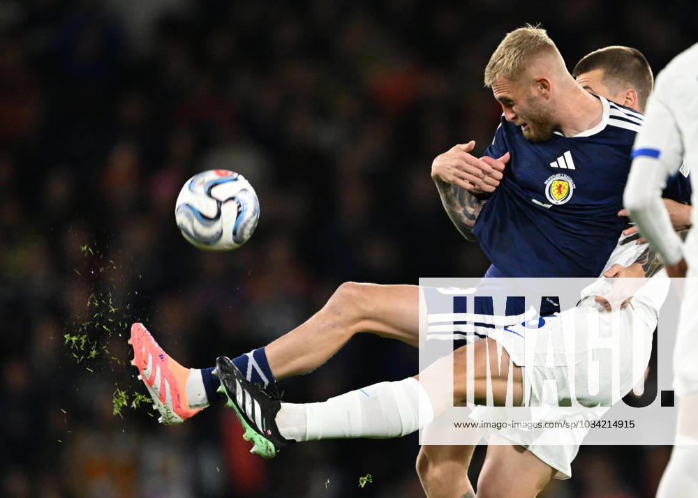 Glasgow, Scotland, 6th October 2026. Oli McBurnie of Scotland and Jaka Bijol of Slovenia during the Scotland vs Slovenia UEFA Nations League match at Hampden Park, Glasgow. Picture credit should read: Neil Hanna Sportimage . SPI_026_NH_Scotland_Slovenia SPI-5054-0026