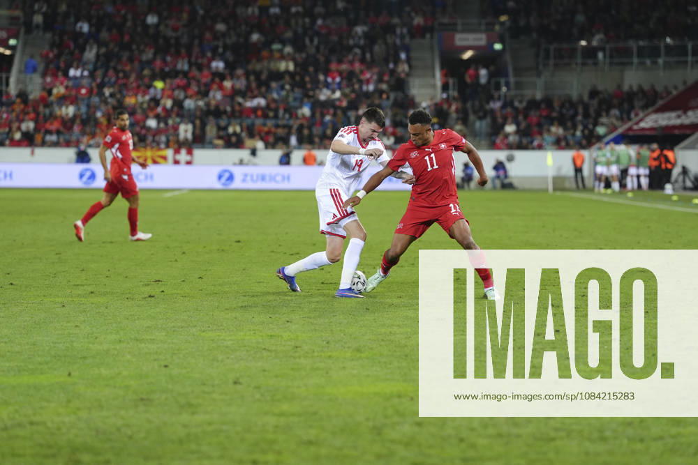 Dan Ndoye (11 SUI) against Ljupche Doriev (19 MKD) during the UEFA Nations League match between Switzerland and North Macedonia at thermoplan arena on October 06, 2026 in Luzern, Switzerland.