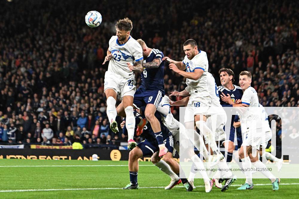 Scotland v Slovenia UEFA Nations League Oli McBurnie of Scotland battles for the ball with David Brekalo of Slovenia in the air during the UEFA Nations League match at Barclays Hampden, Glasgow 06 10 2026 UK Newspapers OUT