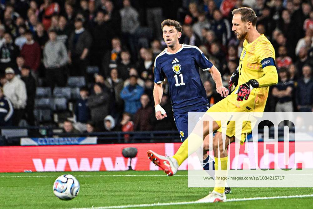 Scotland v Slovenia UEFA Nations League Ryan Christie of Scotland presses Jan Oblak of Slovenia during the UEFA Nations League match at Barclays Hampden, Glasgow 06 10 2026 UK Newspapers OUT