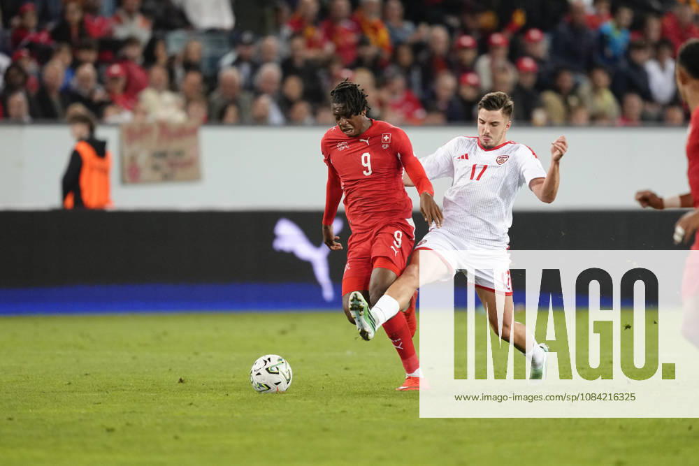 Johan Manzambi (9 SUI) against Azer Omeragikj (17 MKD) during the UEFA Nations League match between Switzerland and North Macedonia at thermoplan arena on October 06, 2026 in Luzern, Switzerland.