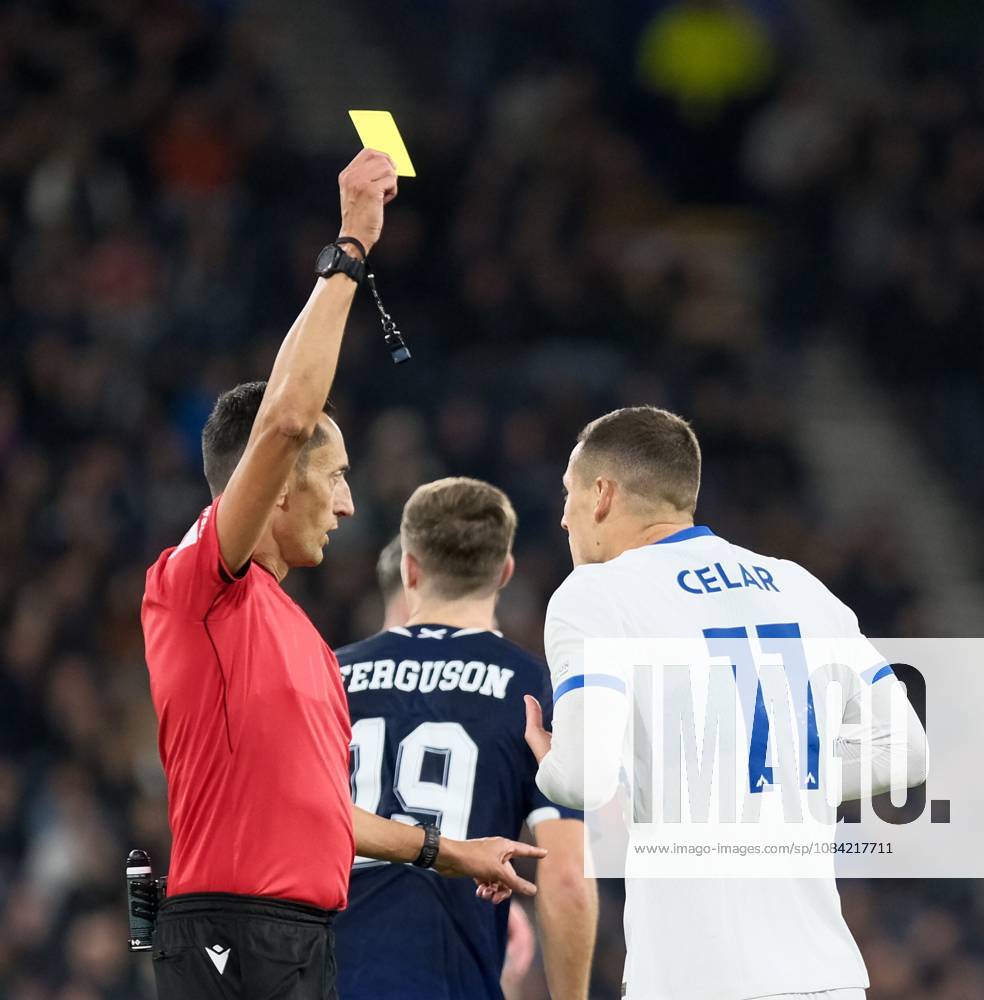 UK: Scotland v Slovenia, UEFA Nations League at Barclays Hampden, Glasgow, Scotland on 06 October 2026: Pictured: Zan Celar (Slovenia) receives a yellow card Glasgow Barclays Hampden Scotland