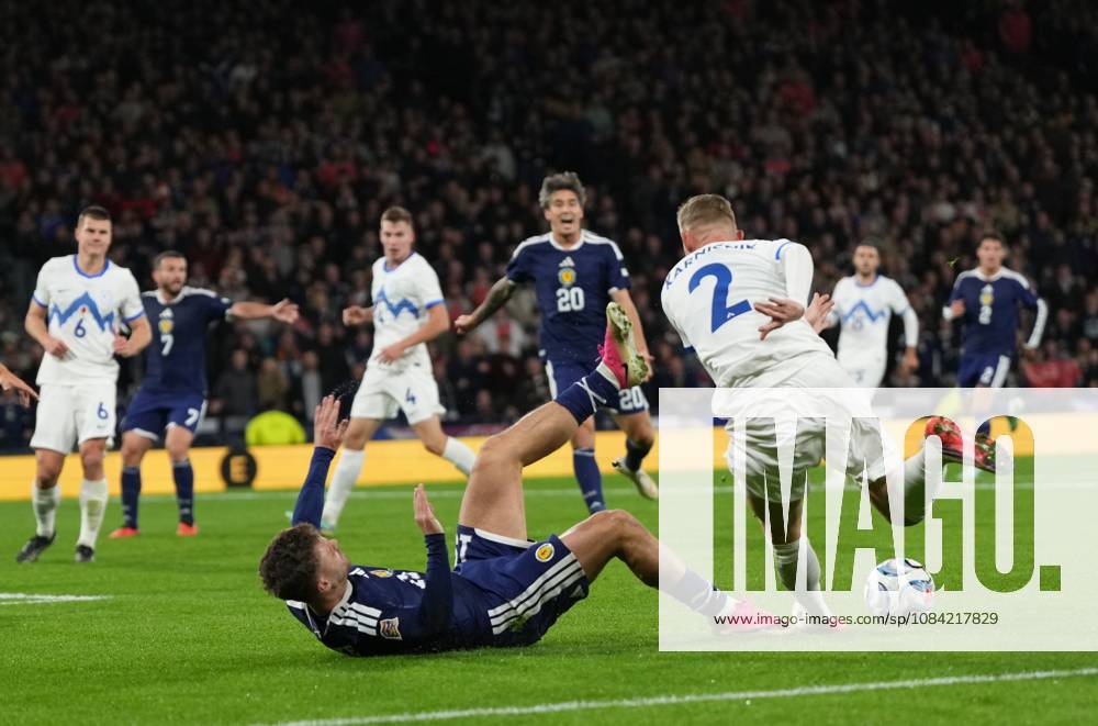 Josh McPake of Scotland challenged on the edge of the Slovenia penalty area by Zan Karnicnik of Slovenia Scotland v Slovenia, Football, UEFA Nation s League, Group B1, Hampden Park, Glasgow, UK, Hampden Park, Glasgow, Scotland, Scotland, UK - 06 Oct 2026Glasgow Hampden Park Scotland United Kingdom