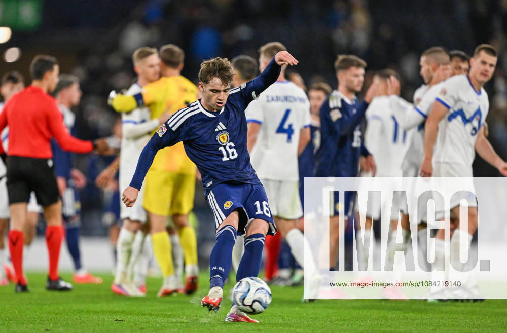 Glasgow, Scotland, 6th October 2026. Findlay Curtis of Scotland boots the ball away in frustration after the Scotland vs Slovenia UEFA Nations League match at Hampden Park, Glasgow. Picture credit should read: Neil Hanna Sportimage . SPI_058_NH_Scotland_Slovenia SPI-5054-0052
