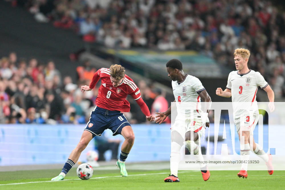 Ryan Naderi of Czechia with the ball as Marc Guehi of England closes during the Nations League match between England and Czechia at Wembley Stadium, London, England on 6 October 2026.