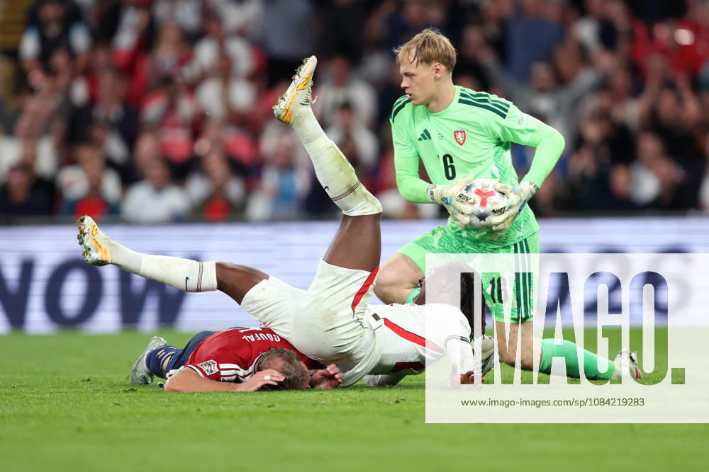 England v Czechia 06 October 2026, London - International Football - UEFA Nations League - England v Czechia - Eberechi Eze of England falls on top of Vladimir Coufal of Czechia as Czechia goalkeeper Lukas Hornicek collects the ball - Photo: Charlotte Wilson Offside. London UK