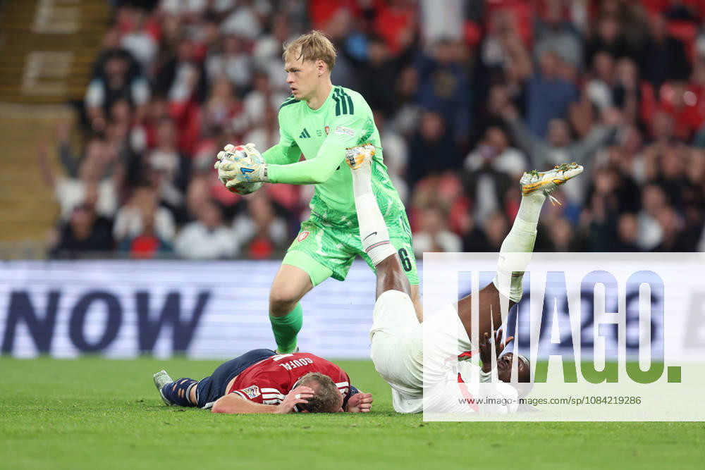 England v Czechia 06 October 2026, London - International Football - UEFA Nations League - England v Czechia - Eberechi Eze of England falls on top of Vladimir Coufal of Czechia as Czechia goalkeeper Lukas Hornicek collects the ball - Photo: Charlotte Wilson Offside. London UK