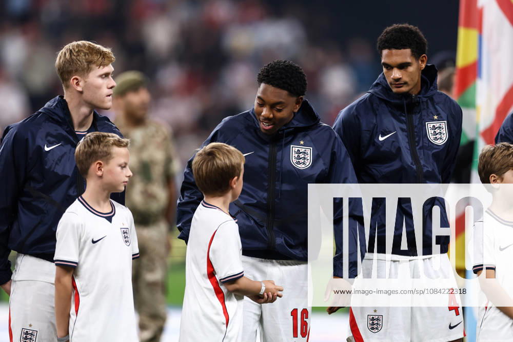 England v Czech Republic 06 October 2026, London - UEFA Nations League - England v Czech Republic - Myles Lewis-Skelly of England chats with a child mascot - Photo: Jacques Feeney Offside. London UK