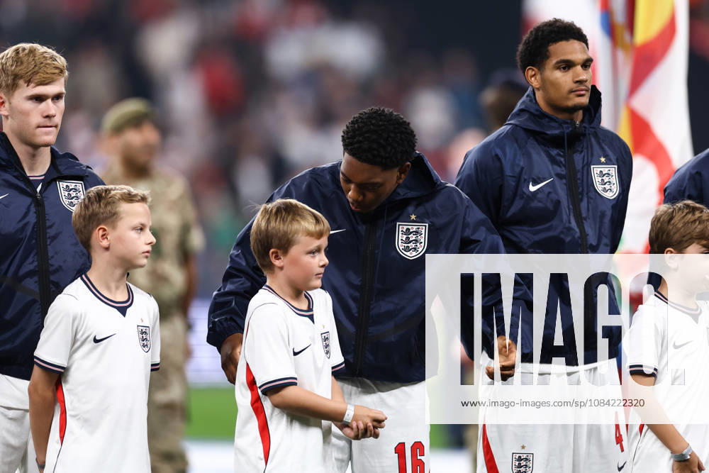England v Czech Republic 06 October 2026, London - UEFA Nations League - England v Czech Republic - Myles Lewis-Skelly of England chats with a child mascot - Photo: Jacques Feeney Offside. London UK