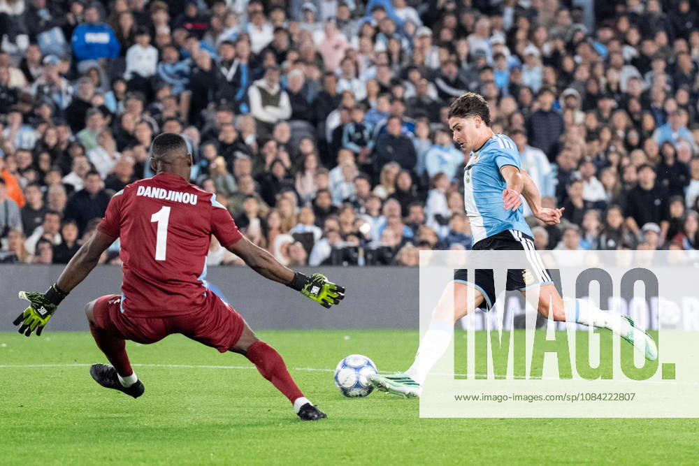 Julian Alvarez of Argentina (R) runs with the ball under pressure from Marcel Dandjinou of Benin (L) during the International Friendly, Länderspiel, Nationalmannschaft football match between Argentina and Benin at Estadio Monumental Antonio V. Liberti on October 06, 2026 in Buenos Aires, Argentina. (Photo by Richard Callis Sports Press Photo)
