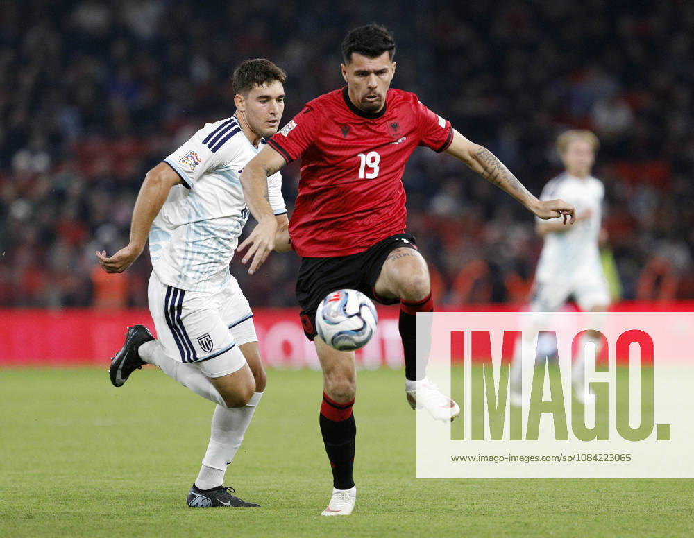 UEFA Nations League Qualifier Albania vs San Marino in Tirana, Albania. Mirlind Daku of Albania (R) and Marco Pasolini of San Marino (L) fight for the ball during the UEFA Nations League Group C match between Albania and Belarus at Air Albania Stadium in Tirana, Albania, on October 6, 2026. Light Studio Agency Malton Dibra Tirana Albania