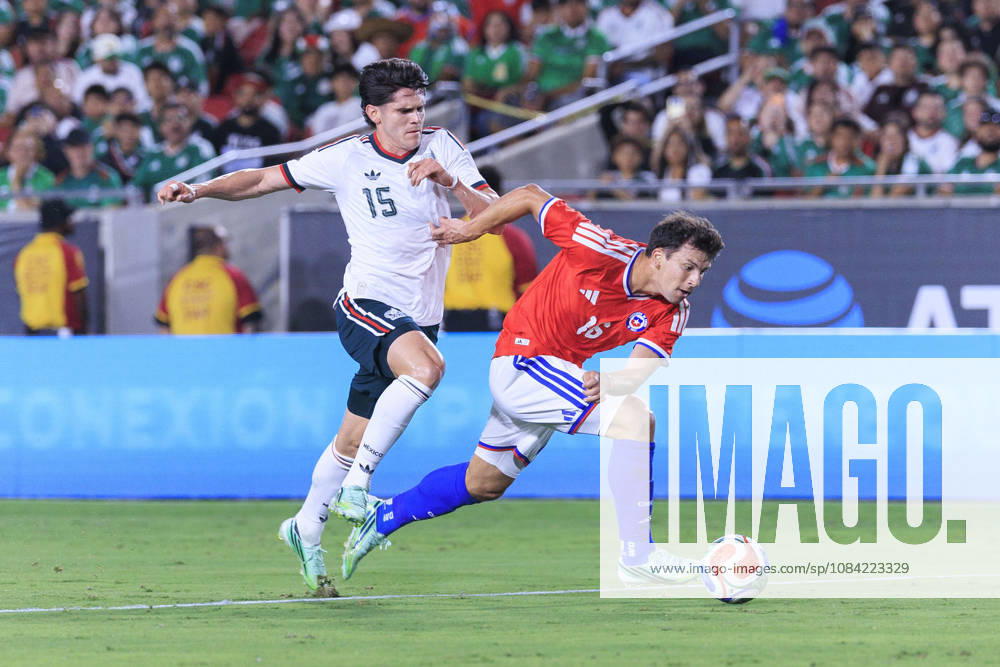 Israel Reyes 15 of Mexico stops a run from Gonzalo Tapia 16 of Chile during an International Friendly, Länderspiel, Nationalmannschaft match at the Los Angeles Memorial Coliseum on Tuesday October 6, 2026 in Los Angeles, California. ARIANA RUIZ PI Mexico Vs. Chile - ZUMAp124 20261006_zaa_p124_074