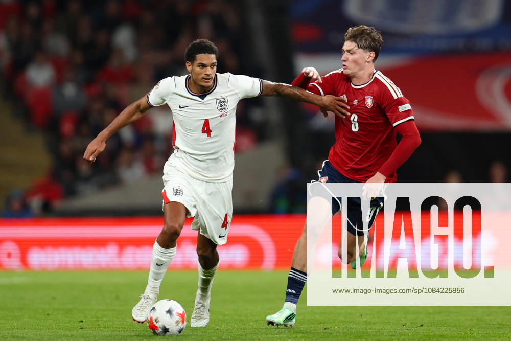 Jarell Quansah of England controls the ball while receiving pressure from Ryan Naderi of Czechia during the UEFA Nations League 2026 27 group phase match between England and Czechia at Wembley Stadium on October 6, 2026 in London, England.