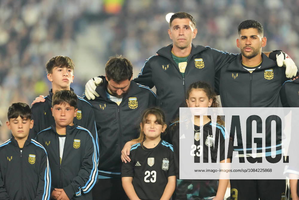 BUENOS AIRES, ARGENTINA 6 OCTOBER: Lionel Messi, an Argentina player, breaks down in tears whilst the Argentine national anthem is being sung, embraced by Emiliano Martinez and Gabriel Cuti Romero during a friendly match between Argentina and Benin at the Estadio Monumental Antonio V. Liberti on 6 October 2026 in Buenos Aires, Argentina.