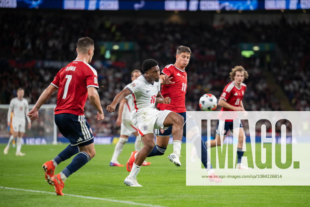 Marc Guehi of England and Adam Hlozek of Czechia challenge for the loose ball during the Nations League match between England and Czechia at Wembley Stadium, London, England on 6 October 2026.