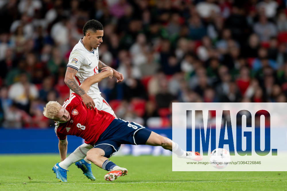 Morgan Rogers of England and Aindrej Zmrzly of Czechia challenge for the ball during the Nations League match between England and Czechia at Wembley Stadium, London, England on 6 October 2026.