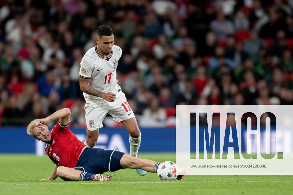 Morgan Rogers of England and Aindrej Zmrzly of Czechia challenge for the ball during the Nations League match between England and Czechia at Wembley Stadium, London, England on 6 October 2026.