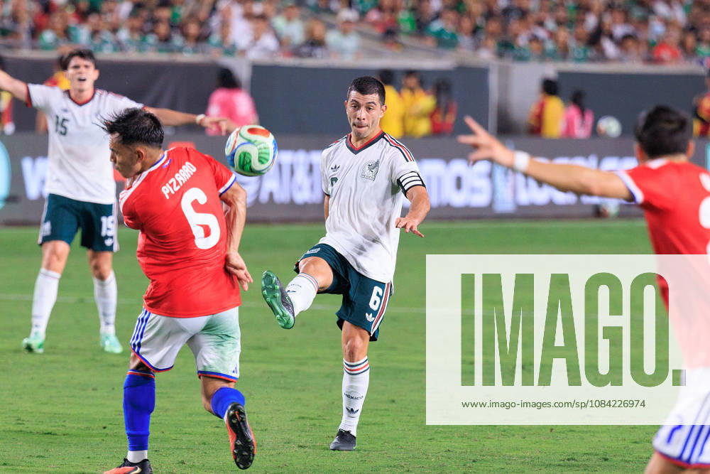 Erik Lira 6 of Mexico passes the ball over Vicente Pizarro 6 of Chile during an International Friendly, Länderspiel, Nationalmannschaft match at Los Angeles Memorial Coliseum on Tuesday, October 6, 2026, in Los Angeles, California. Mexico loses to Chile, 0-2. JAVIER ROJAS PI Los Angeles USA - ZUMAp124 20261006_zaa_p124_146