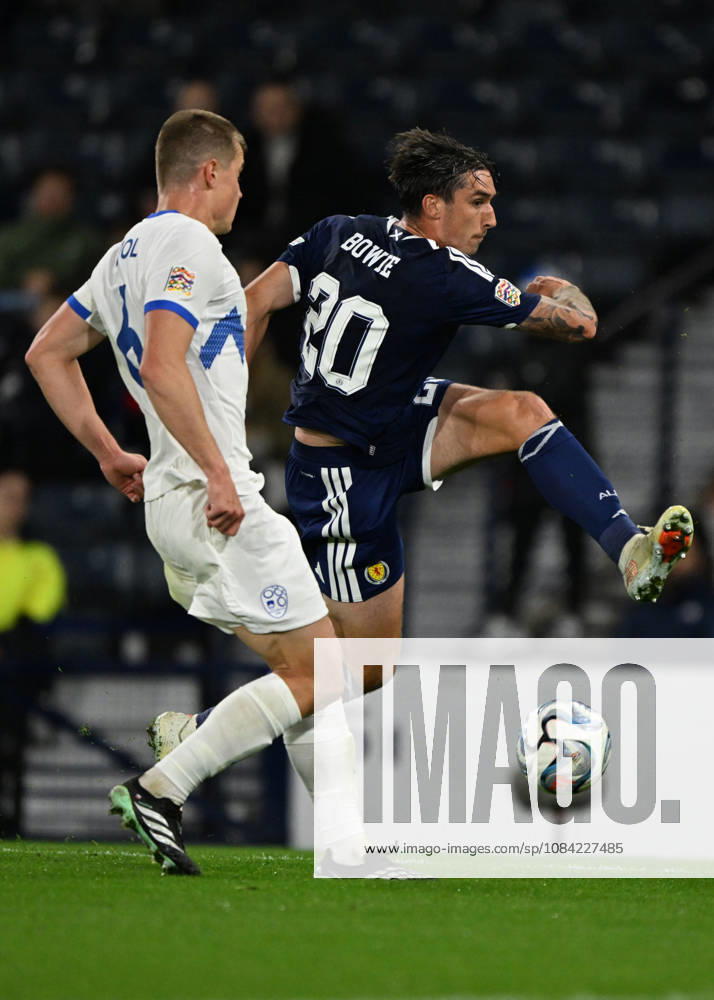Glasgow, Scotland, 6th October 2026. Jaka Bijol of Slovenia and Kieron Bowie of Scotland during the Scotland vs Slovenia UEFA Nations League match at Hampden Park, Glasgow. Picture credit should read: Neil Hanna Sportimage . SPI_085_NH_Scotland_Slovenia SPI-5054-0085