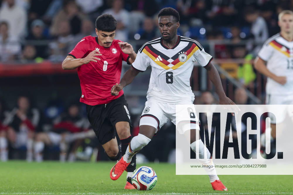Dachi Lordkipanidze (Georgia) und Noel Aseko (Germany) battle for the ball during the UEFA Under21 EURO Qualifier, EM, Europameisterschaft between Germany U21, U 21 and Georgia U21 at Almstadion on October 6, 2026 in Bielefeld, Germany. (Photo by Marco Steinbrenner DeFodi Images) -