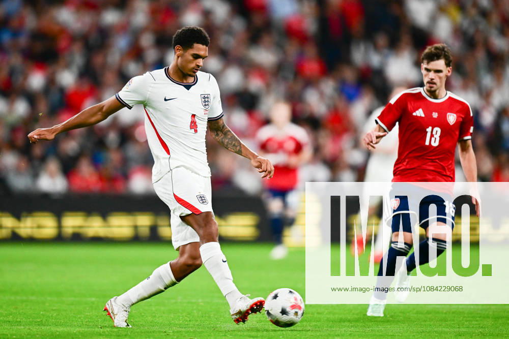 England v Czechia, UEFA Nations League England defender Jarell Quansah (4) on the ball under pressure from Czechia midfielder Lukas Ambros (13) during the UEFA Nations League match between England and Czechia at Wembley Stadium, London, UK on 6 October 2026. London Wembley Stadium Greater London UK Editorial use only ,