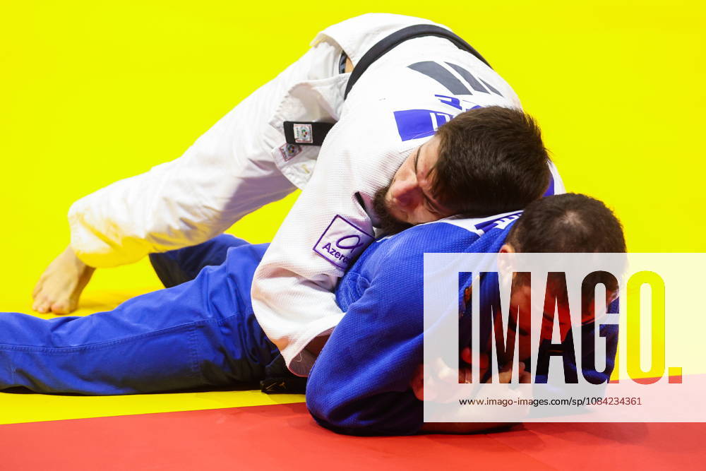 AZERBAIJAN, BAKU - OCTOBER 7, 2026: Omar Radzhabli (top) of Azerbaijan and Abylaikhan Zhubanazar of Kazakhstan compete in their -81 kg bout as part of the 2026 World Judo Championships at the National Gymnastics Arena 2026 World Judo Championships In Baku - ZUMAt113 20261007_zaa_t113_452