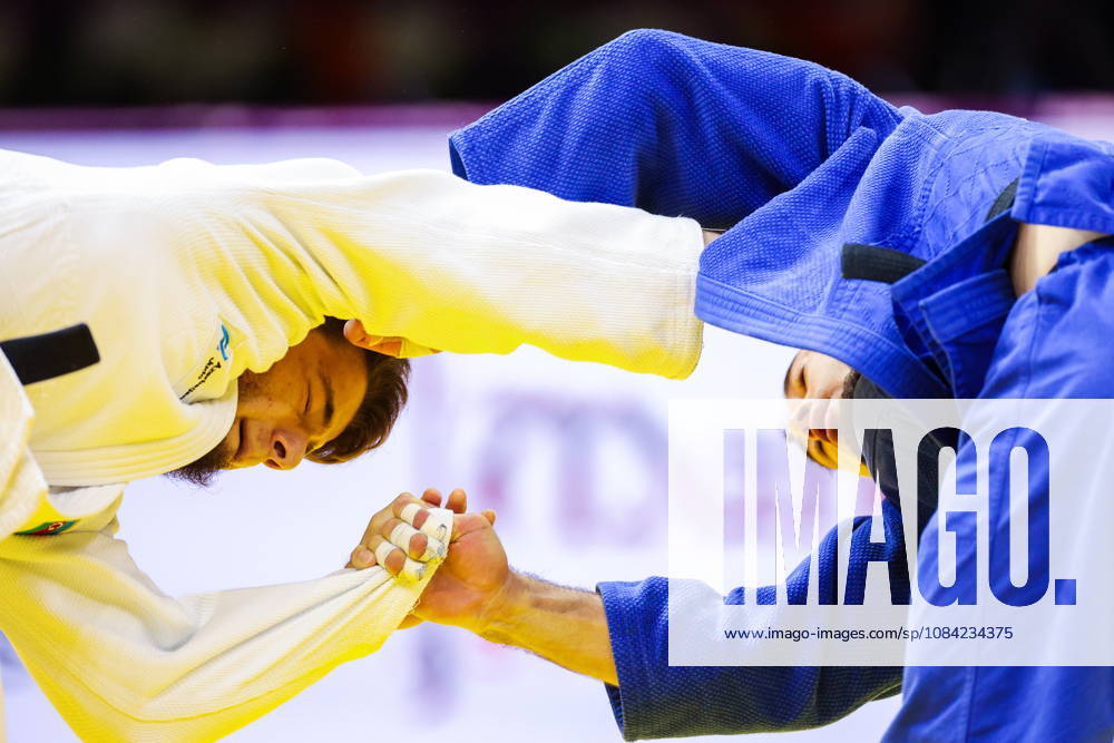 AZERBAIJAN, BAKU - OCTOBER 7, 2026: Omar Radzhabli (L) of Azerbaijan and Abylaikhan Zhubanazar of Kazakhstan compete in their -81 kg bout as part of the 2026 World Judo Championships at the National Gymnastics Arena 2026 World Judo Championships In Baku - ZUMAt113 20261007_zaa_t113_454