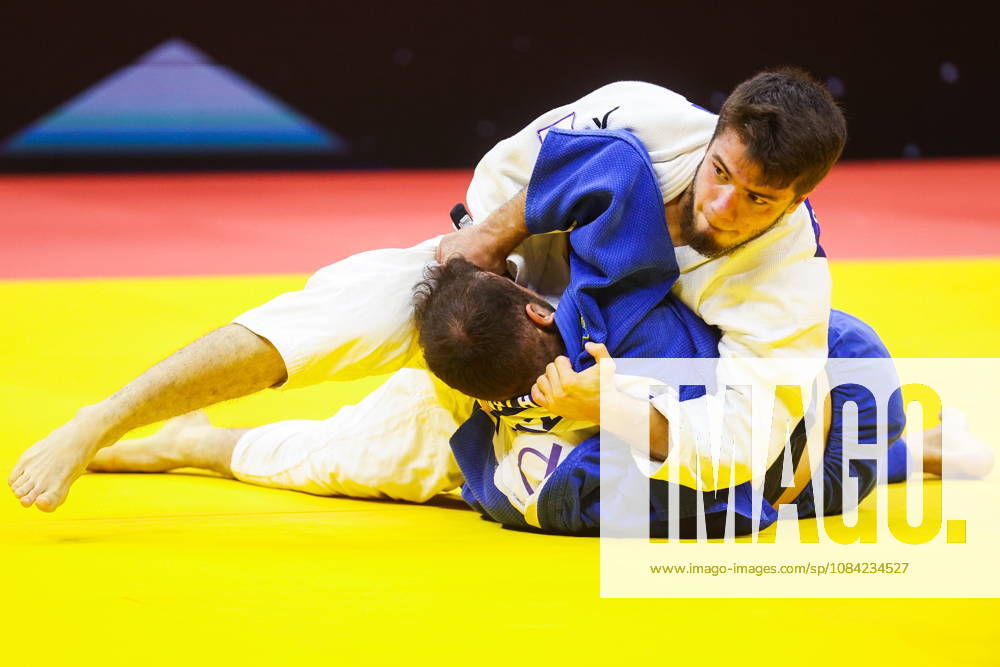 AZERBAIJAN, BAKU - OCTOBER 7, 2026: Omar Radzhabli (top) of Azerbaijan and Abylaikhan Zhubanazar of Kazakhstan compete in their -81 kg bout as part of the 2026 World Judo Championships at the National Gymnastics Arena 2026 World Judo Championships In Baku - ZUMAt113 20261007_zaa_t113_468