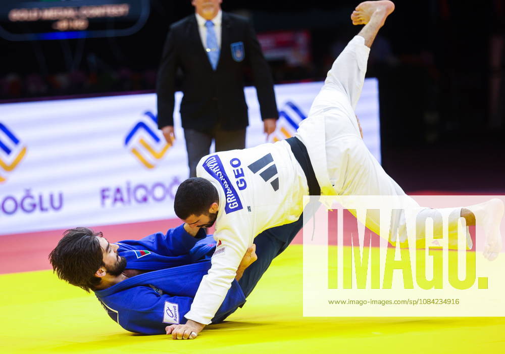 AZERBAIJAN, BAKU - OCTOBER 7, 2026: Zelim Tckaev (top) of Azerbaijan and Tato Grigalashvili of Georgia compete in their -81 kg bout as part of the 2026 World Judo Championships at the National Gymnastics Arena. Mikhail Sinitsyn TASS 98916902