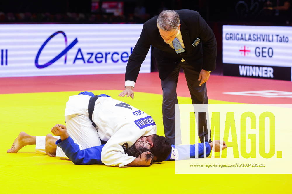 AZERBAIJAN, BAKU - OCTOBER 7, 2026: Tato Grigalashvili (L) of Georgia and Zelim Tckaev of Azerbaijan compete in their -81 kg bout as part of the 2026 World Judo Championships at the National Gymnastics Arena. Mikhail Sinitsyn TASS 98918069