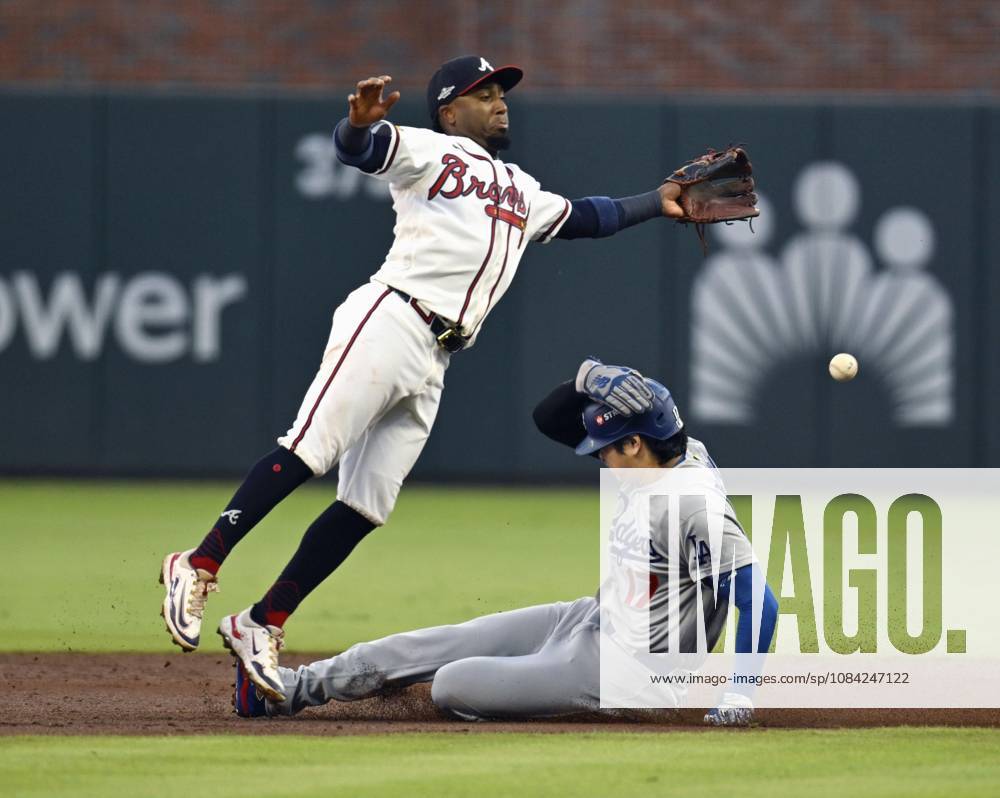 Baseball: Division Series between Dodgers and Braves Los Angeles Dodgers designated hitter Shohei Ohtani (R) steals second base as Atlanta Braves second baseman Ozzie Albies fails to gather the ball during the second inning of Game 4 of the National League Division Series at Truist Park in Atlanta on Oct. 7, 2026. A14AA0005630401P