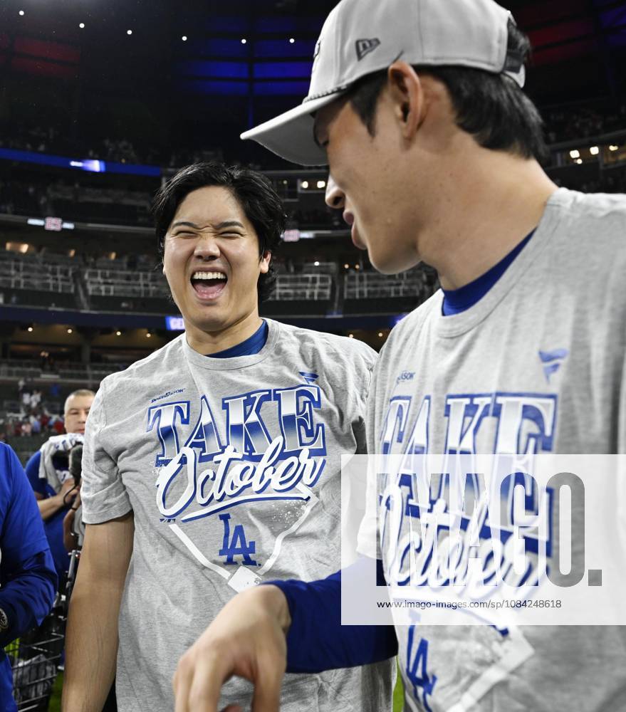 Baseball: Division Series between Dodgers and Braves Los Angeles Dodgers designated hitter Shohei Ohtani (C) and pitcher Roki Sasaki celebrate after winning Game 4 of the National League Division Series against the Atlanta Braves at Truist Park in Atlanta on Oct. 7, 2026, and advancing to the National League Championship Series. A14AA0005630423P