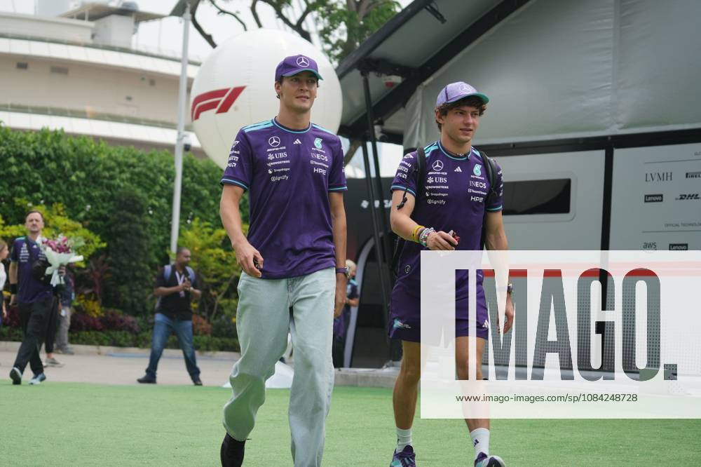 George Russell (GBR) (Mercedes-AMG Petronas F1 Team) and Andrea Kimi Antonelli (ITA) (Mercedes-AMG Petronas F1 Team) in the paddock of the Formula 1 Singapore Grand Prix 2026 at the Marina Bay Street Circuit. Singapore Singapore - ZUMAs197 20261008_aaa_s197_007