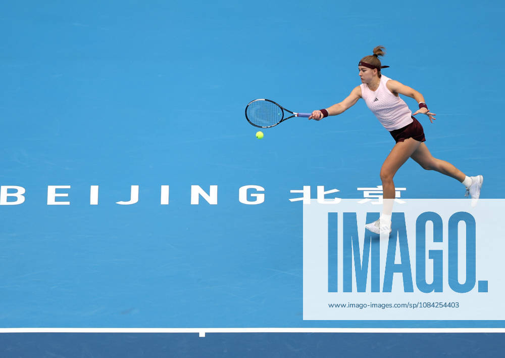 (261008) -- BEIJING, Oct. 8, 2026 -- Karolina Muchova of the Czech Republic hits a return during the women s singles quarterfinal match between Karolina Muchova of the Czech Republic and Nikola Bartunkova of the Czech Republic at 2026 China Open tennis tournament in Beijing, China, Oct. 8, 2026. ) (SP)CHINA-BEIJING-TENNIS-CHINA OPEN-WOMEN S SINGLES (CN) ZhangxChenlin