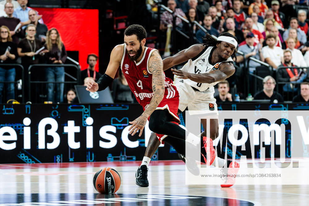 Duane Washington (FC Bayern Muenchen, 4) controls the ball against Rasheed Bello (Virtus Bologna, 0) during the Turkish Airlines EuroLeague match between FC Bayern Muenchen vs. Virtus Bologna at SAP Garden on round 4 of Turkish Airlines EuroLeague on October 08, 2026 in Munich, Germany. Bavaria Germany