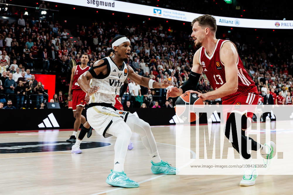 Andreas Andi Obst (FC Bayern Muenchen, 13) controls the ball against Trent Frazier (Virtus Bologna, 1) during the Turkish Airlines EuroLeague match between FC Bayern Muenchen vs. Virtus Bologna at SAP Garden on round 4 of Turkish Airlines EuroLeague on October 08, 2026 in Munich, Germany. Bavaria Germany