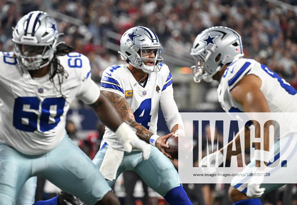 Dallas Cowboys Dak Prescott hands off against the Tampa Bay Buccaneers during their game at AT&T Stadium in Arlington, Texas on Thursday, October 8, 2026. ARL2026100812 IANxHALPERIN