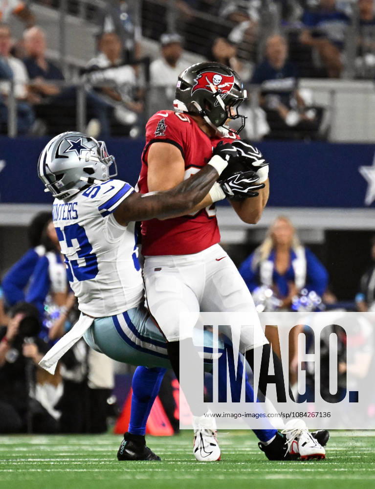 Tampa Bay Buccaneers Cade Otton gets wrapped by Dallas Cowboys Dee Winter after a short catch during their game at AT&T Stadium in Arlington, Texas on Thursday, October 8, 2026. ARL2026100819 IANxHALPERIN